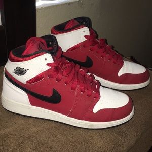 White, red and black Nike Air Jordan’s
